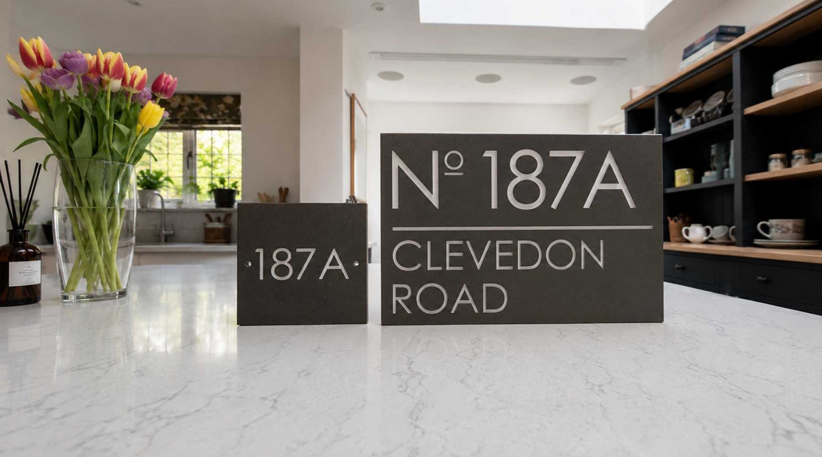 A pair of modern stone signs