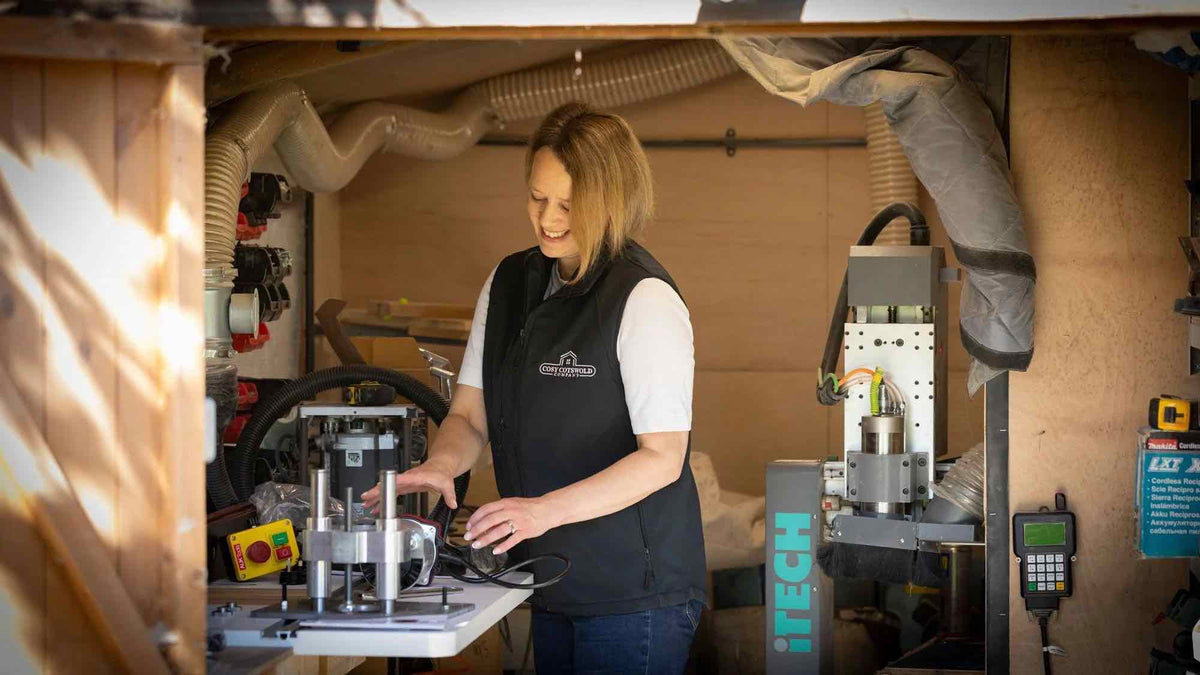 Person working with machinery in a workshop setting
